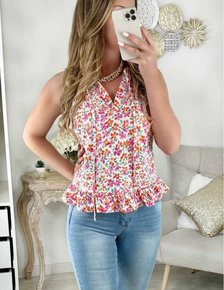 petite_blouse_bas_volant__1.webp My Look Féminin Petite Blouse bas volant "Punchy flowers" Outlet